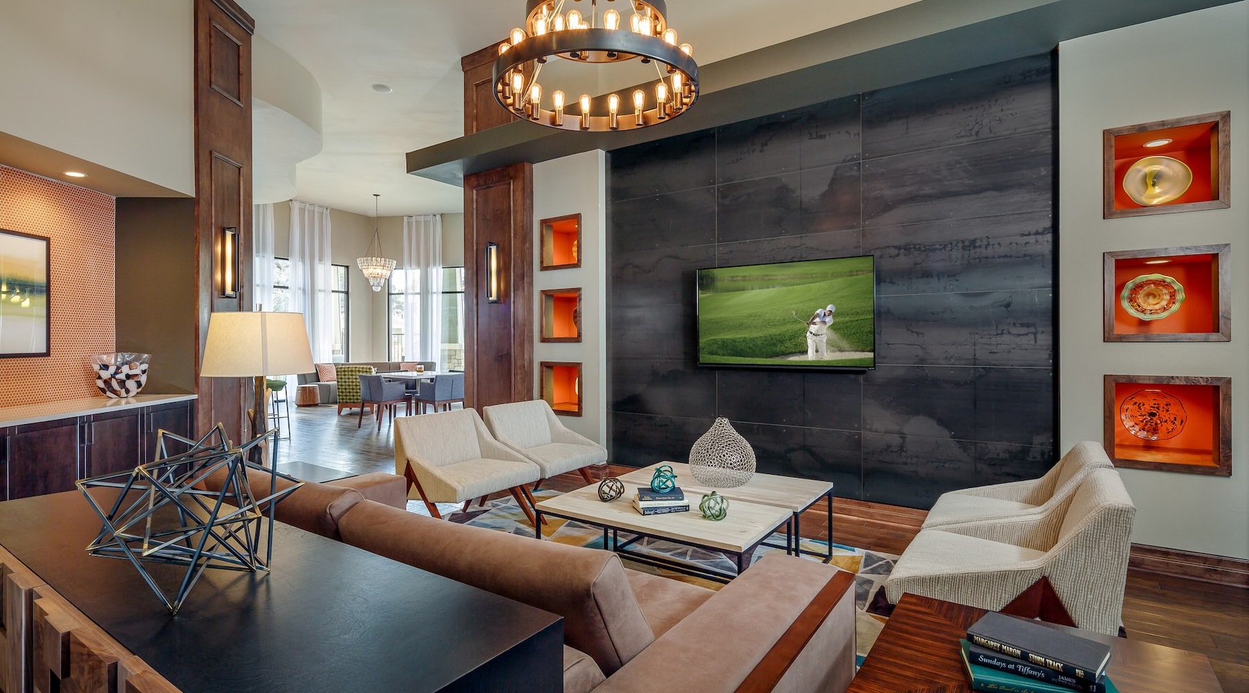 clubhouse with tv and seating